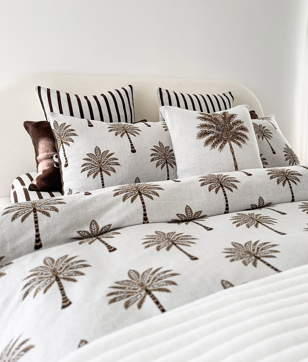 Khaki Sundown jersey cotton duvet cover with plain ivory reversible quilt.