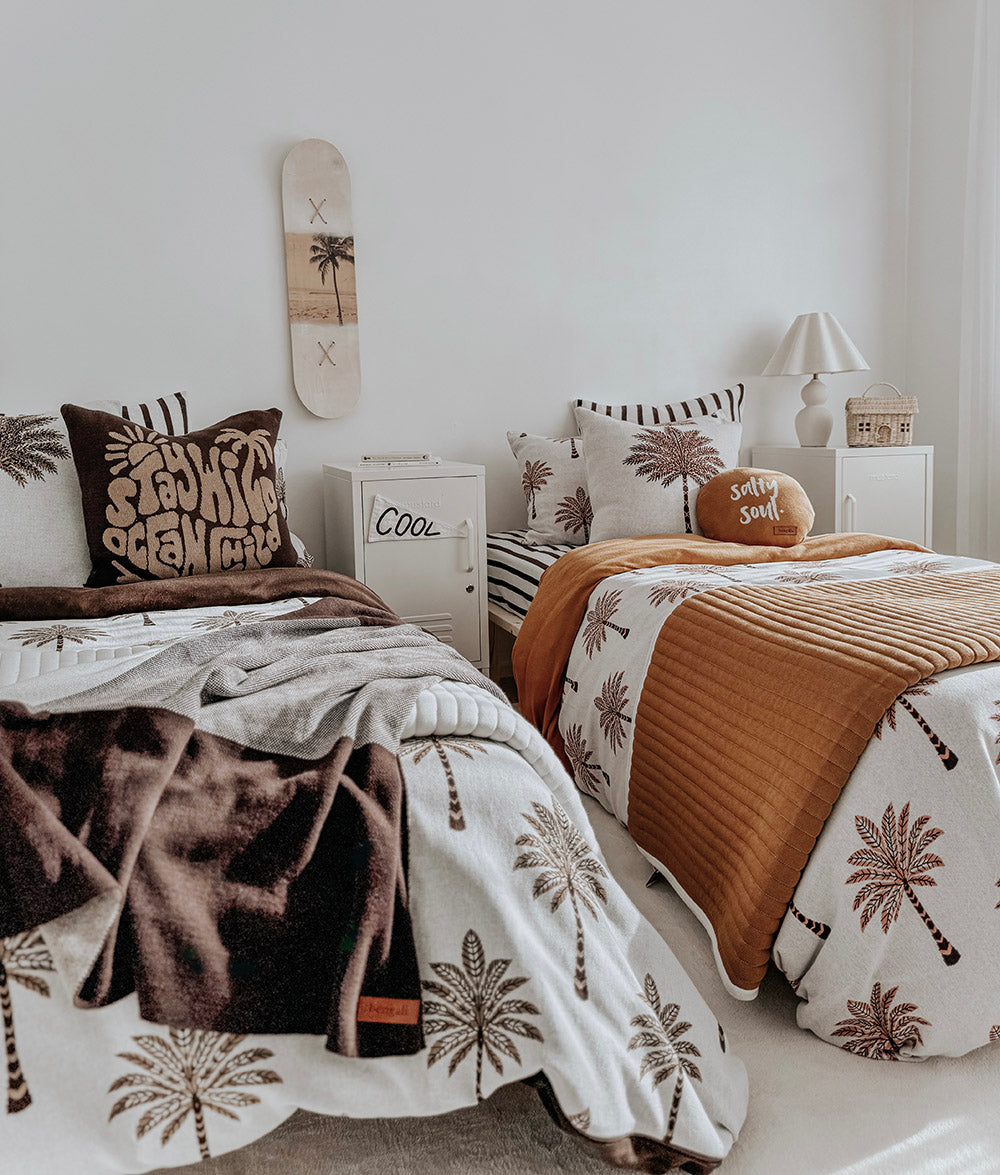 Khaki Sundown jersey cotton duvet cover styled with matching throw blanket.