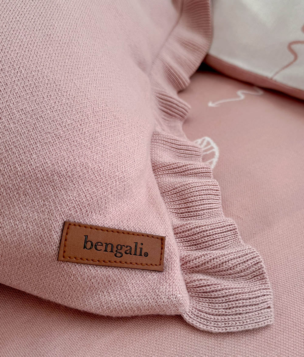 Close-up of the frill detailing and Bengali leather label on the "Bare Feet Salty Hair" pillowcase.