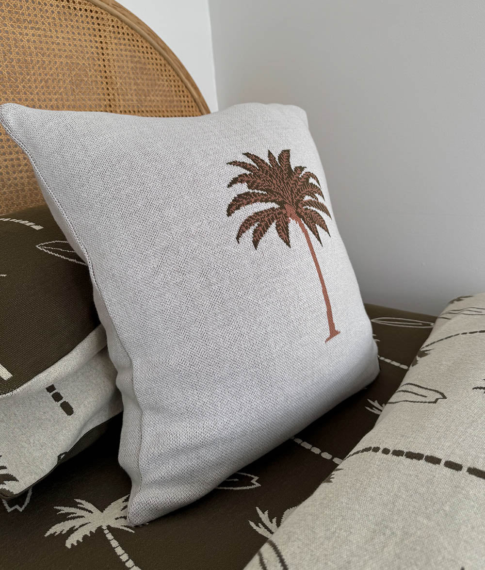 Olive Palm Motif cushion cover styled in a child's bedroom.
