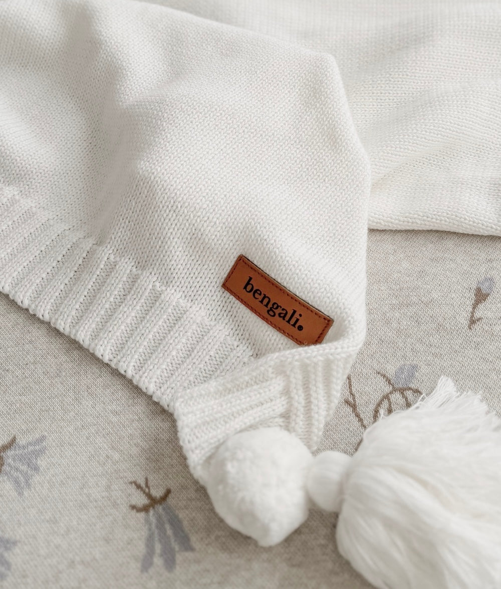 Bengali Home® | Nursery & Bedroom Decor - Ivory Pom Knitted Blanket