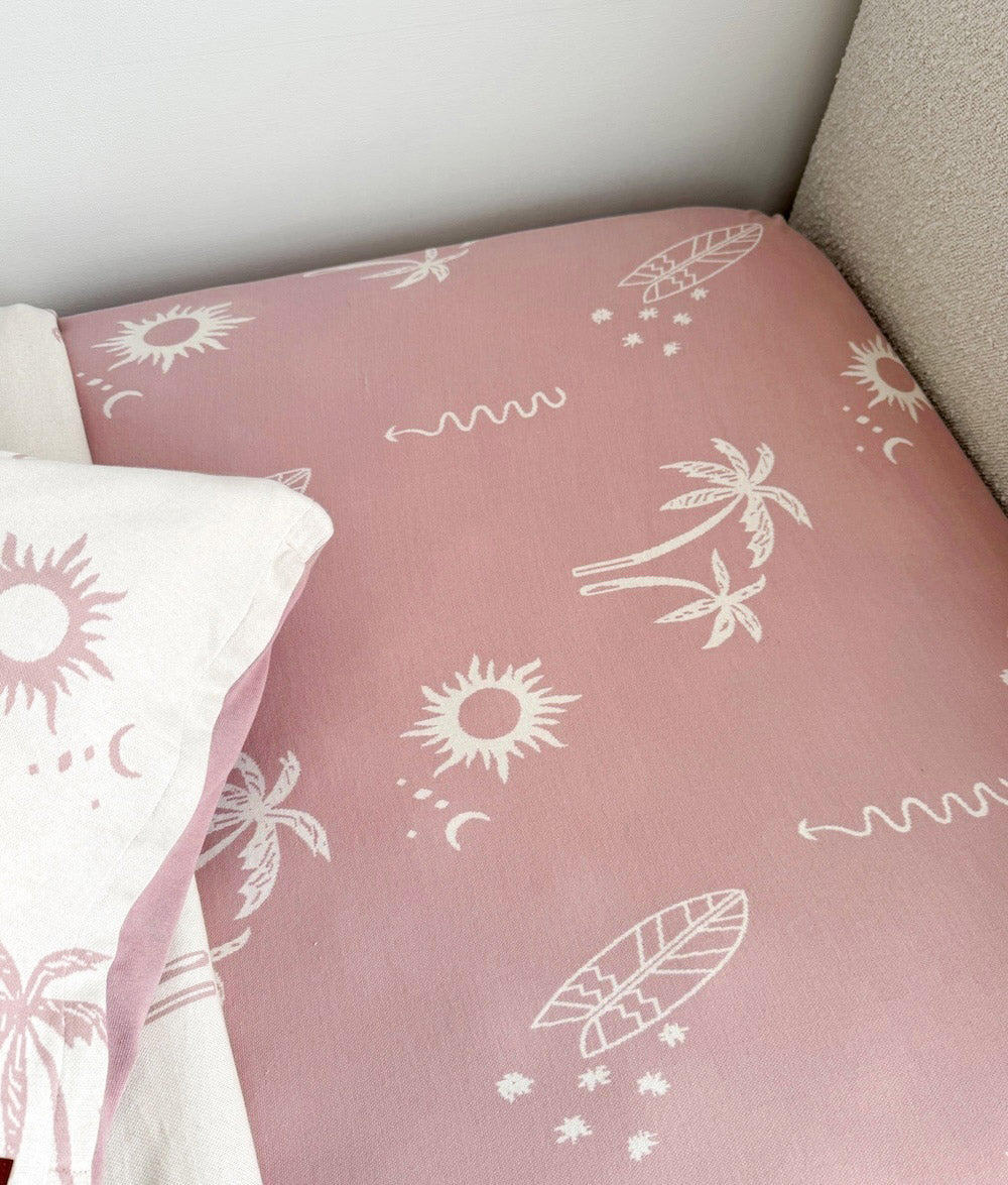 Close-up of the Sun Kissed jersey cotton fitted sheet.