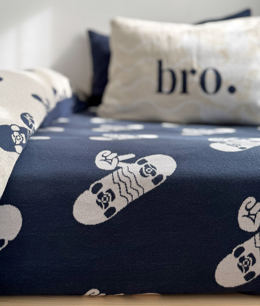 "bro." reversible pillowcase styled with Tidal Blue Skater Life fitted sheet.
