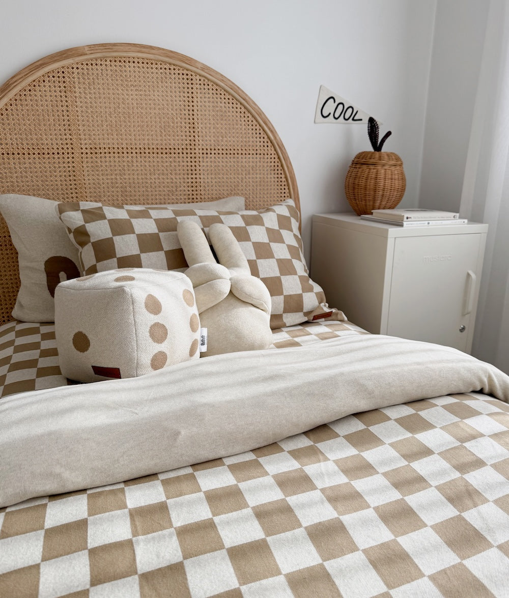 Front view of the Khaki Gingham duvet cover on a made bed.