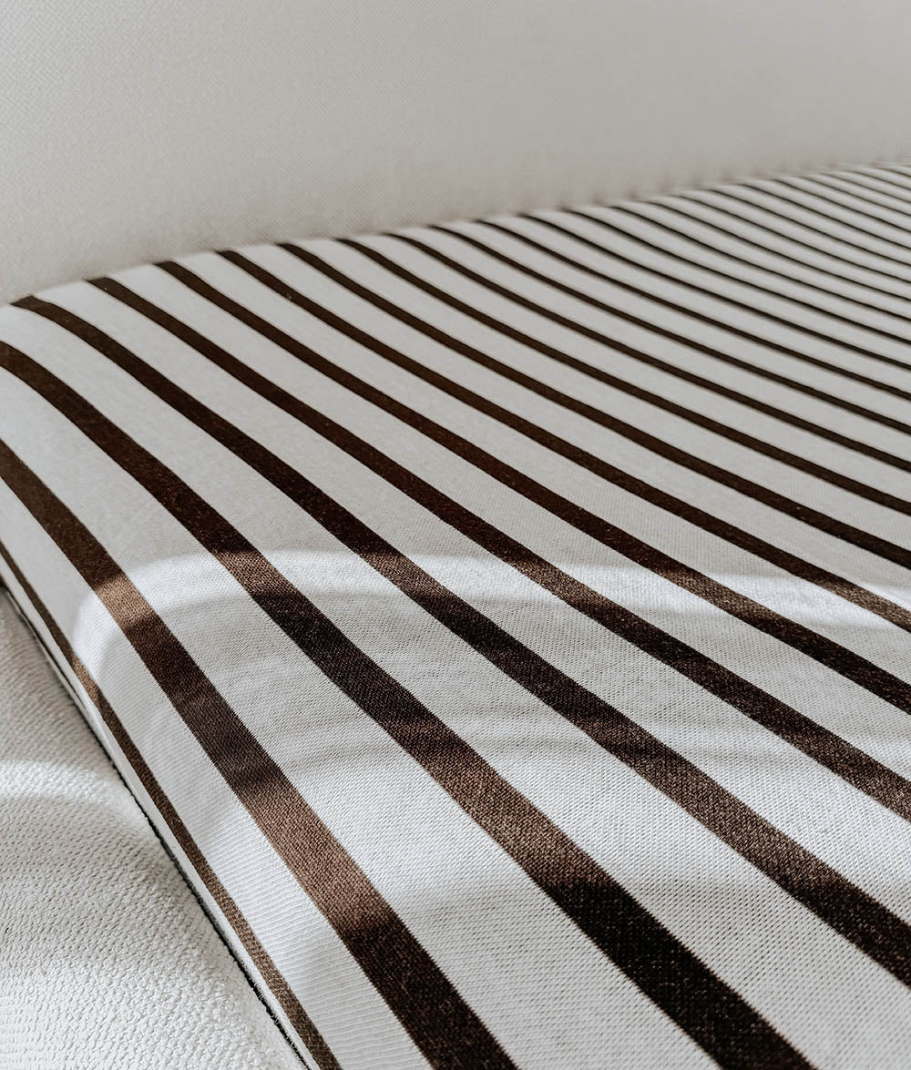 Sundown Stripe jersey cotton fitted sheet in chocolate and ivory stripes.