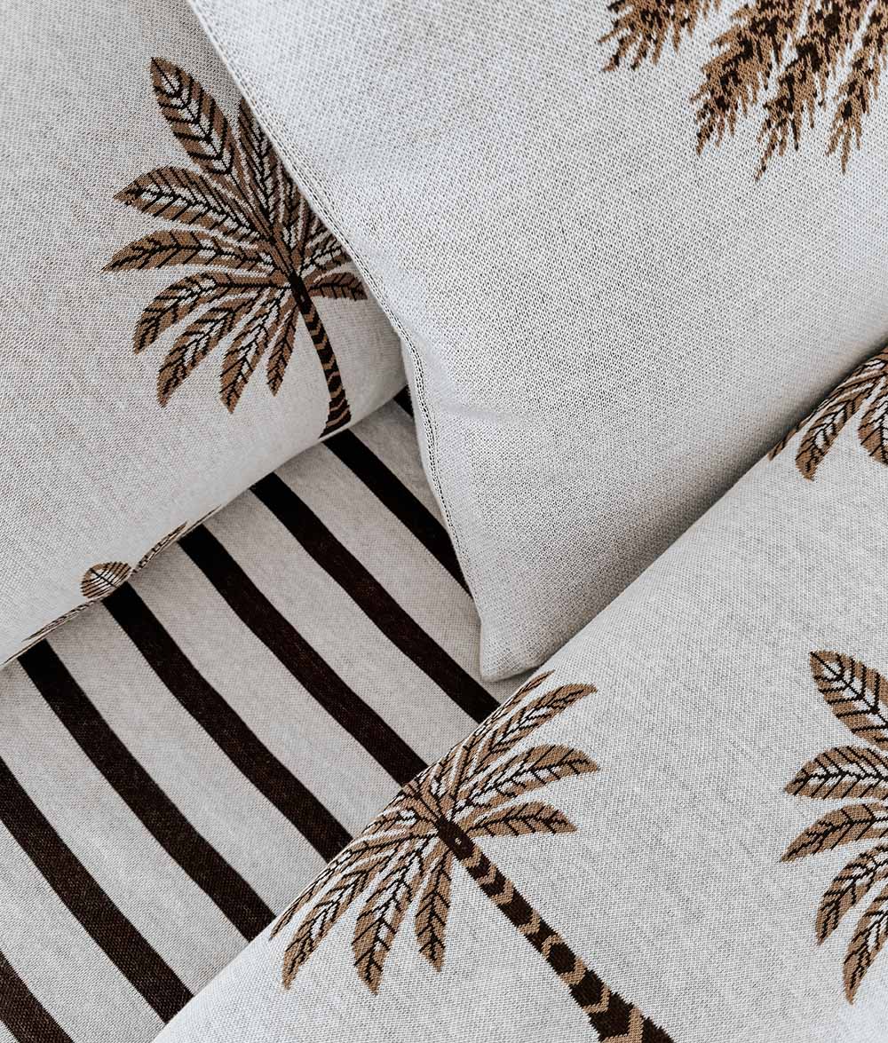 Sundown Stripe jersey cotton fitted sheet styled with the Peach Sundown bedding.
