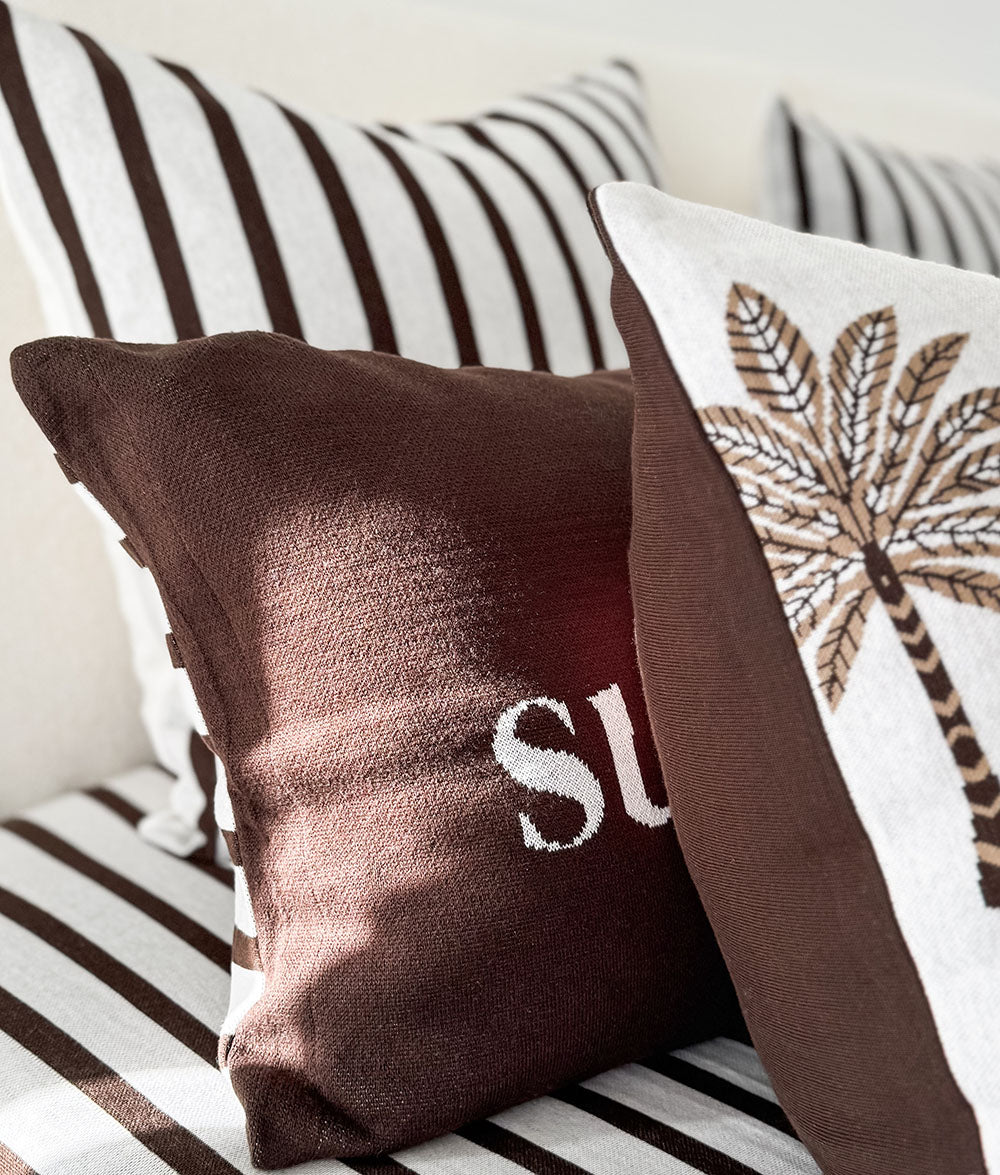 "Sundown." pillowcase styled with Khaki Sundown bedding.