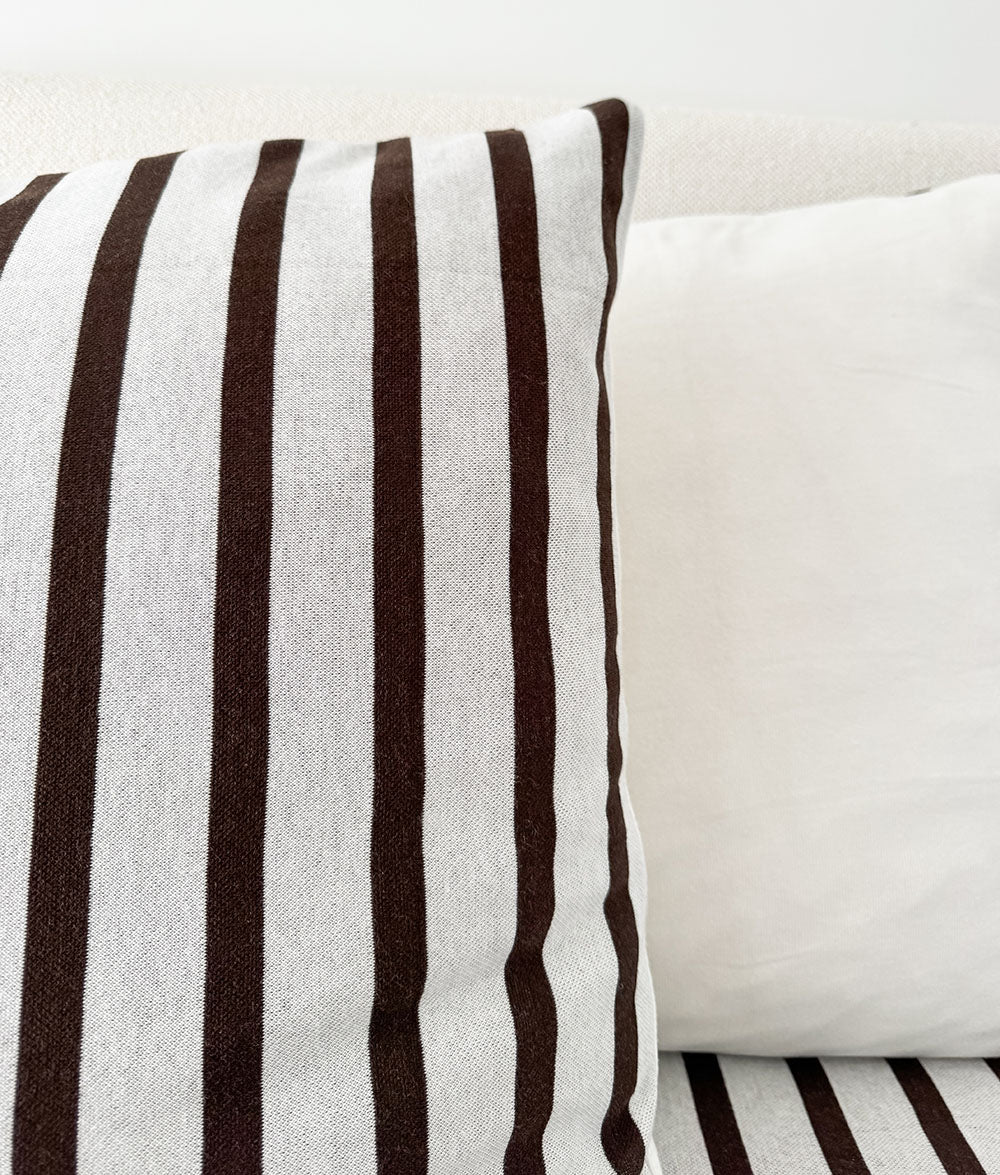 Close-up of the plain ivory reverse on the Sundown Stripe Euro pillowcase.