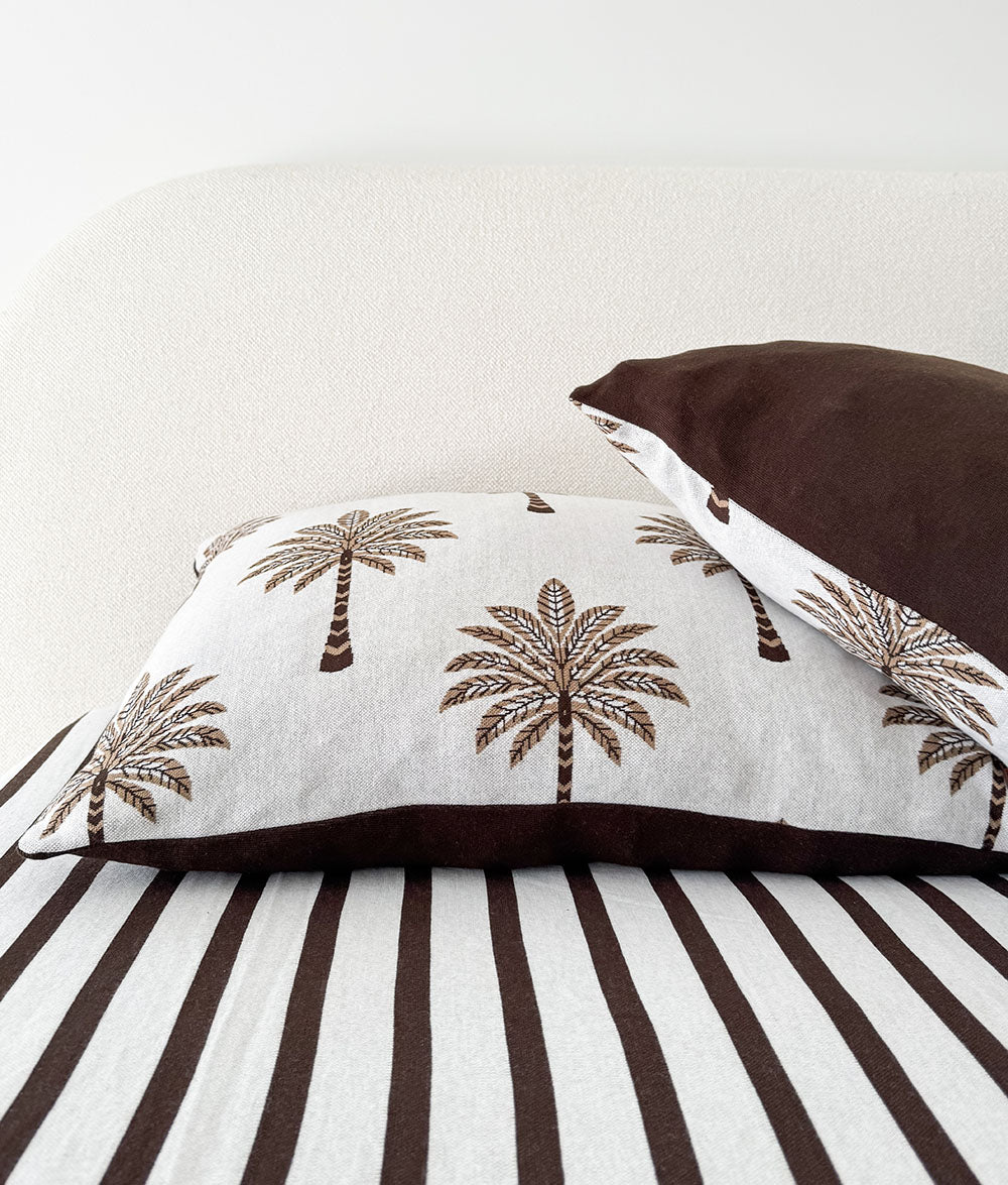 Sundown Stripe jersey cotton fitted sheet styled with the Khaki Sundown bedding.