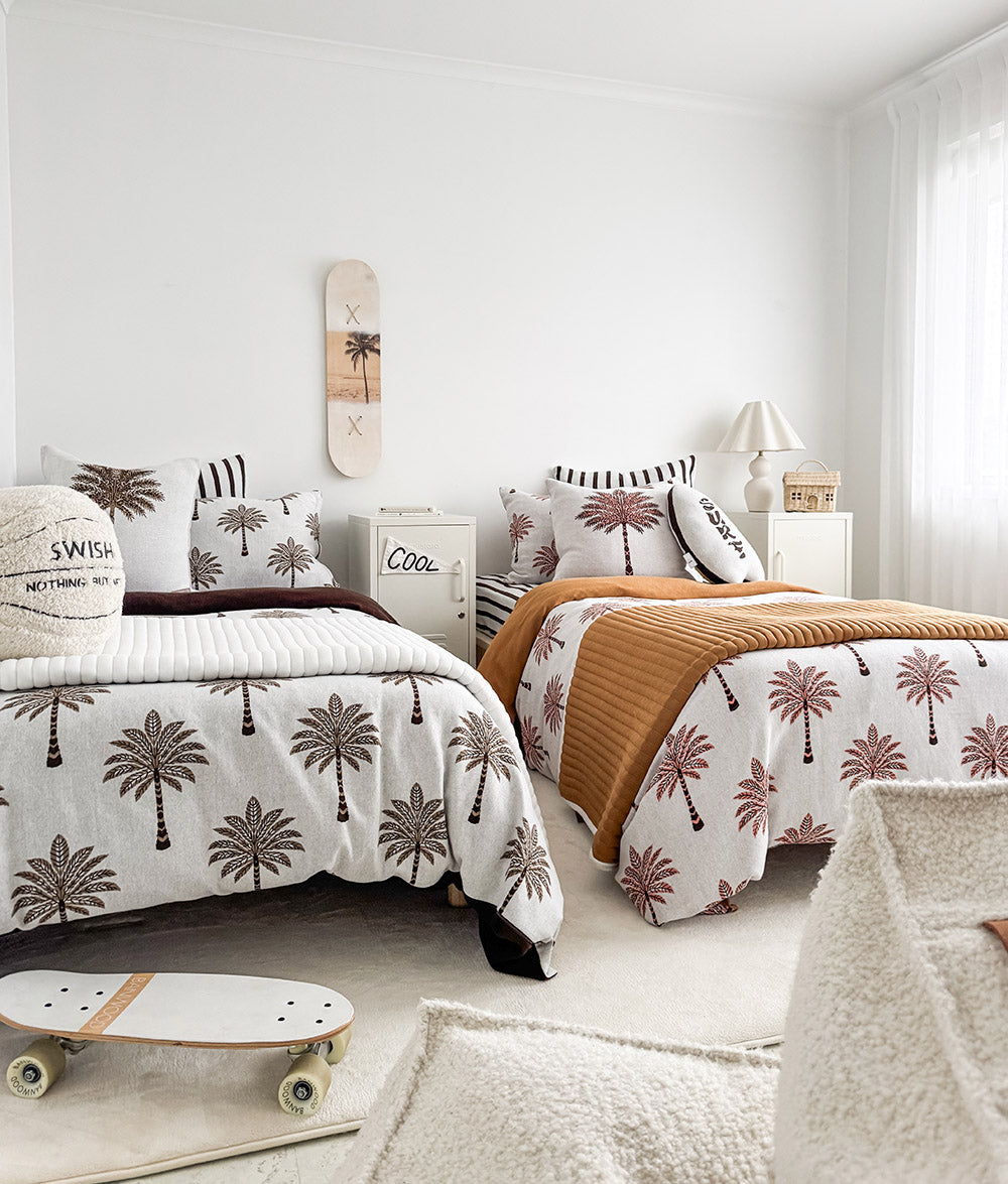 Khaki Sundown reversible pillowcase styled with coordinating Sundown collection bedding.