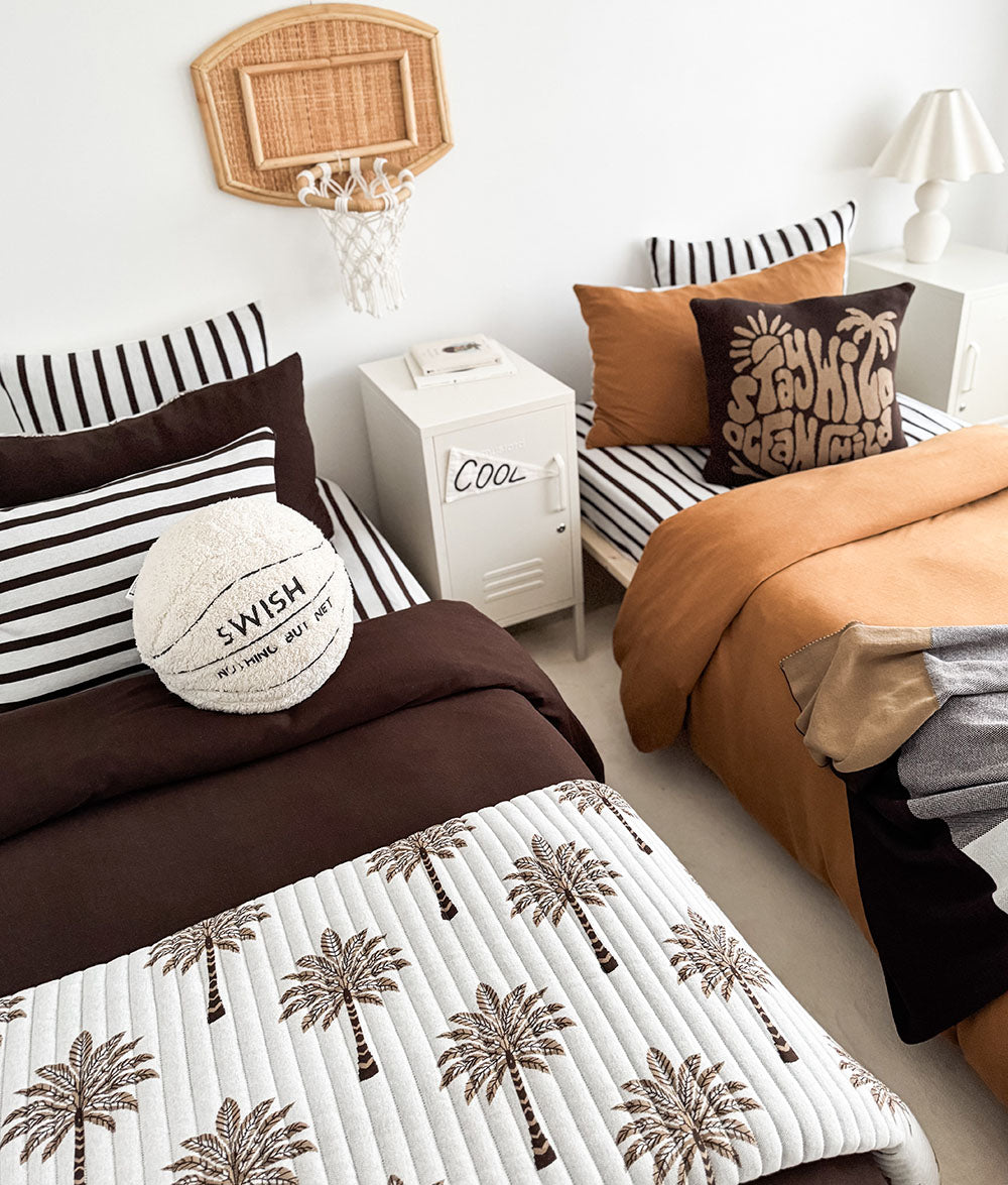 Sherpa basketball play cushion styled in a child's bedroom.