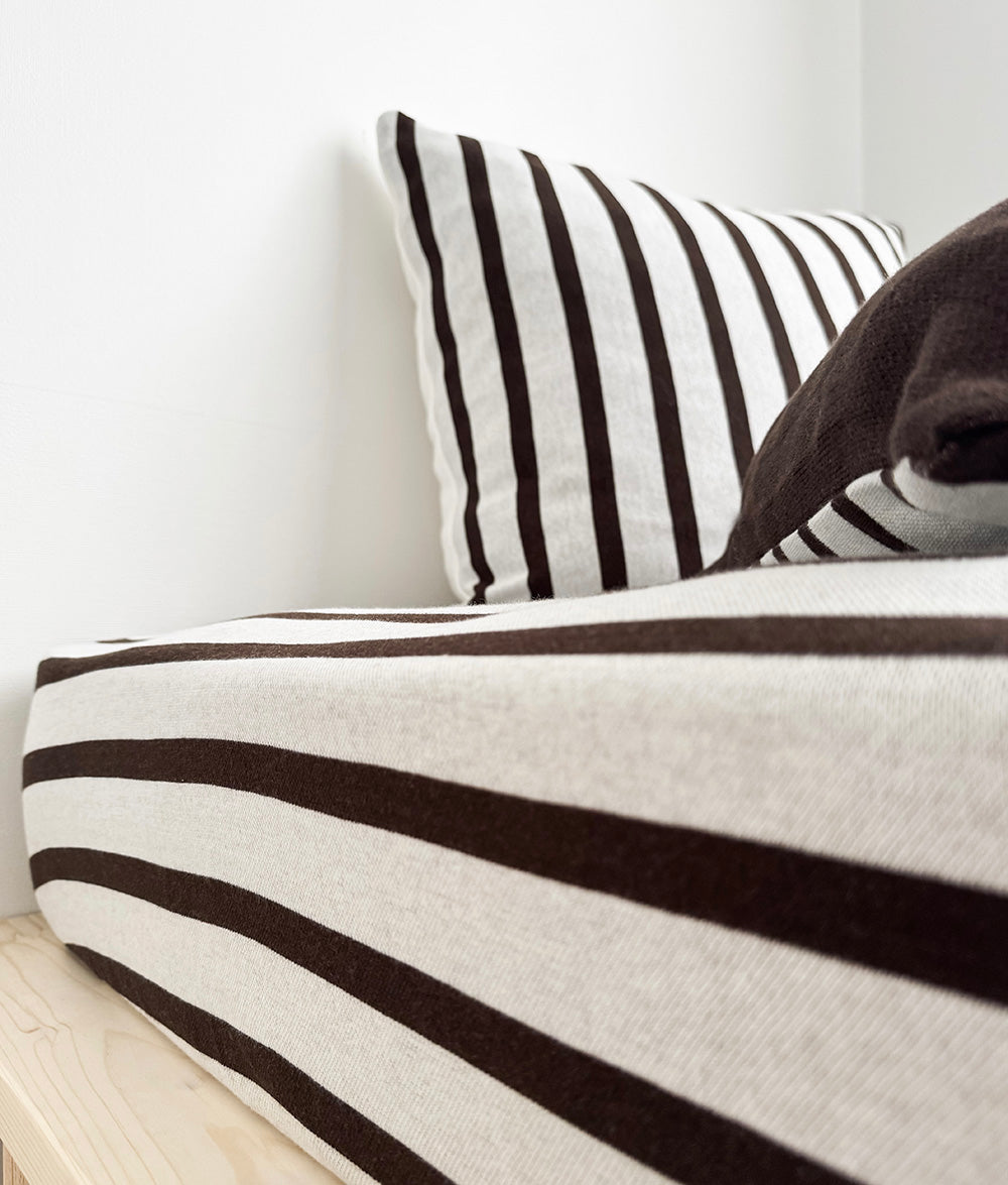 Sundown Stripe jersey cotton fitted sheet with matching striped pillowcase.
