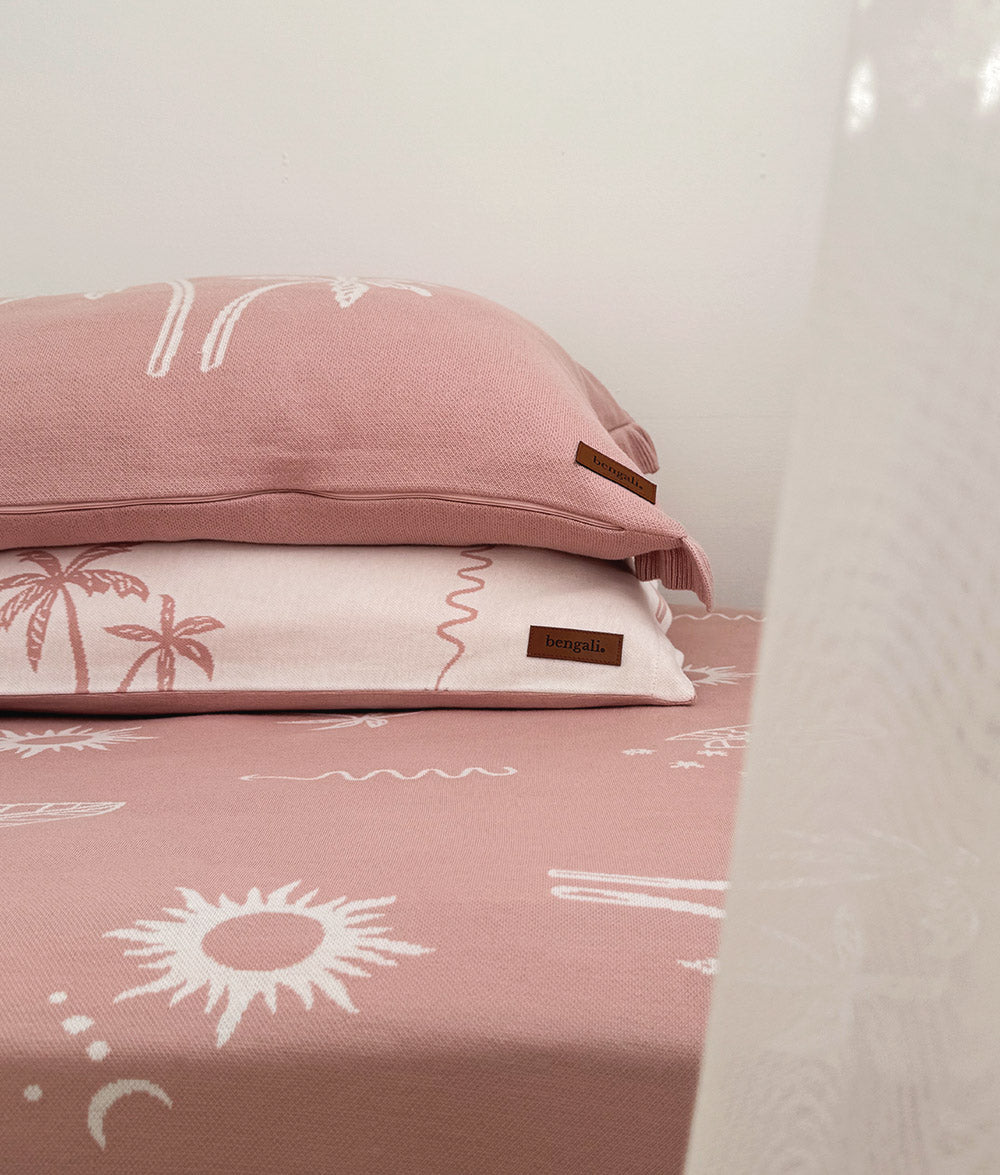 Folded Sun Kissed jersey cotton fitted sheet with Bengali leather label.