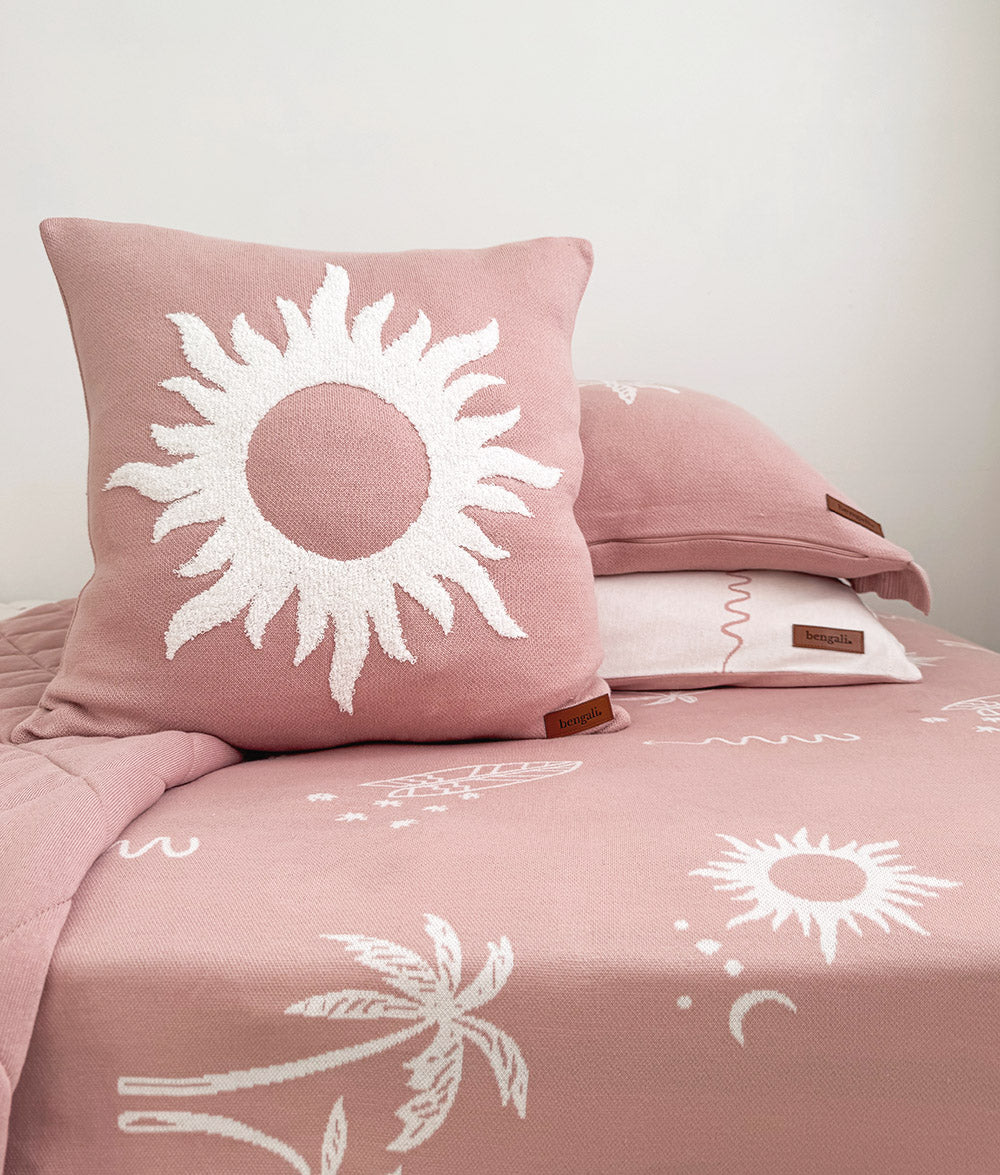 Sun Kissed jersey cotton fitted sheet styled with the Sun cushion.
