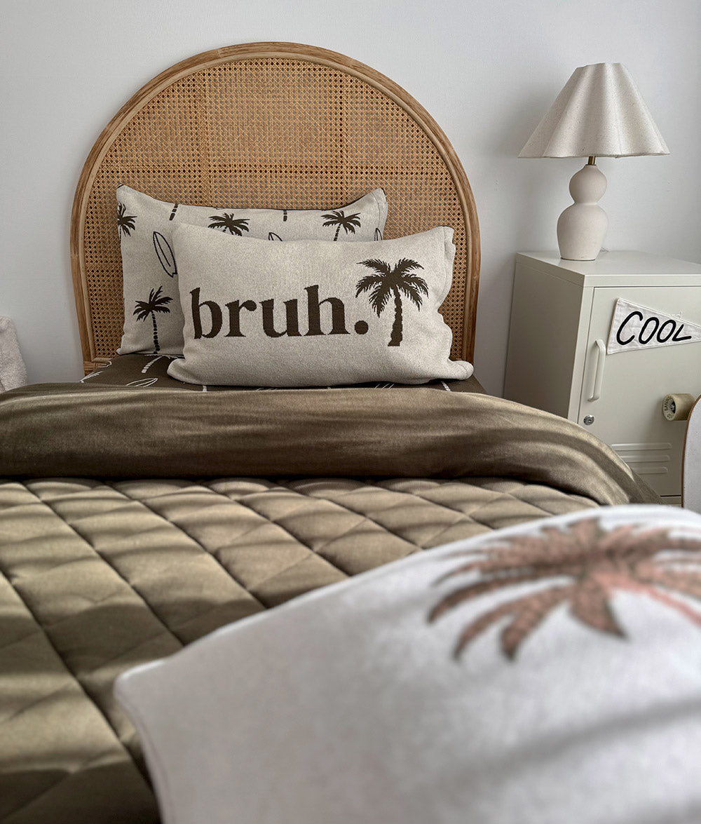 Olive Palm Motif cushion cover with Olive Surfing Palm bedding.