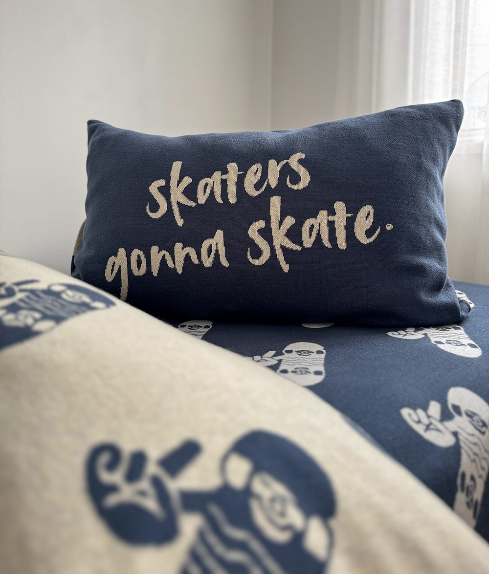 "Skaters Gonna Skate" cushion styled with Tidal Blue Skater Life jersey cotton bedding.