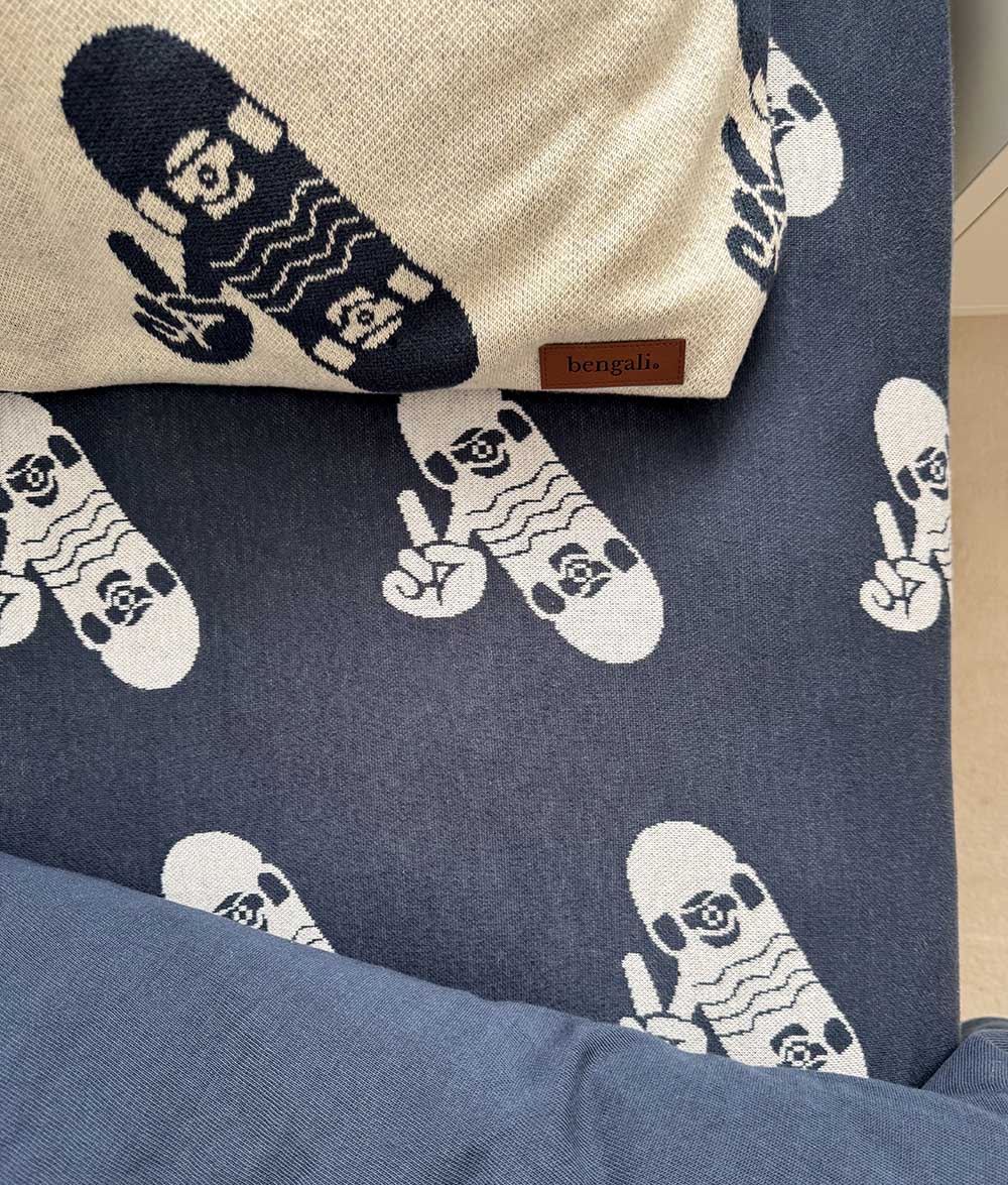 Close-up of the Tidal Blue Skater Life fitted sheet with Bengali leather label.